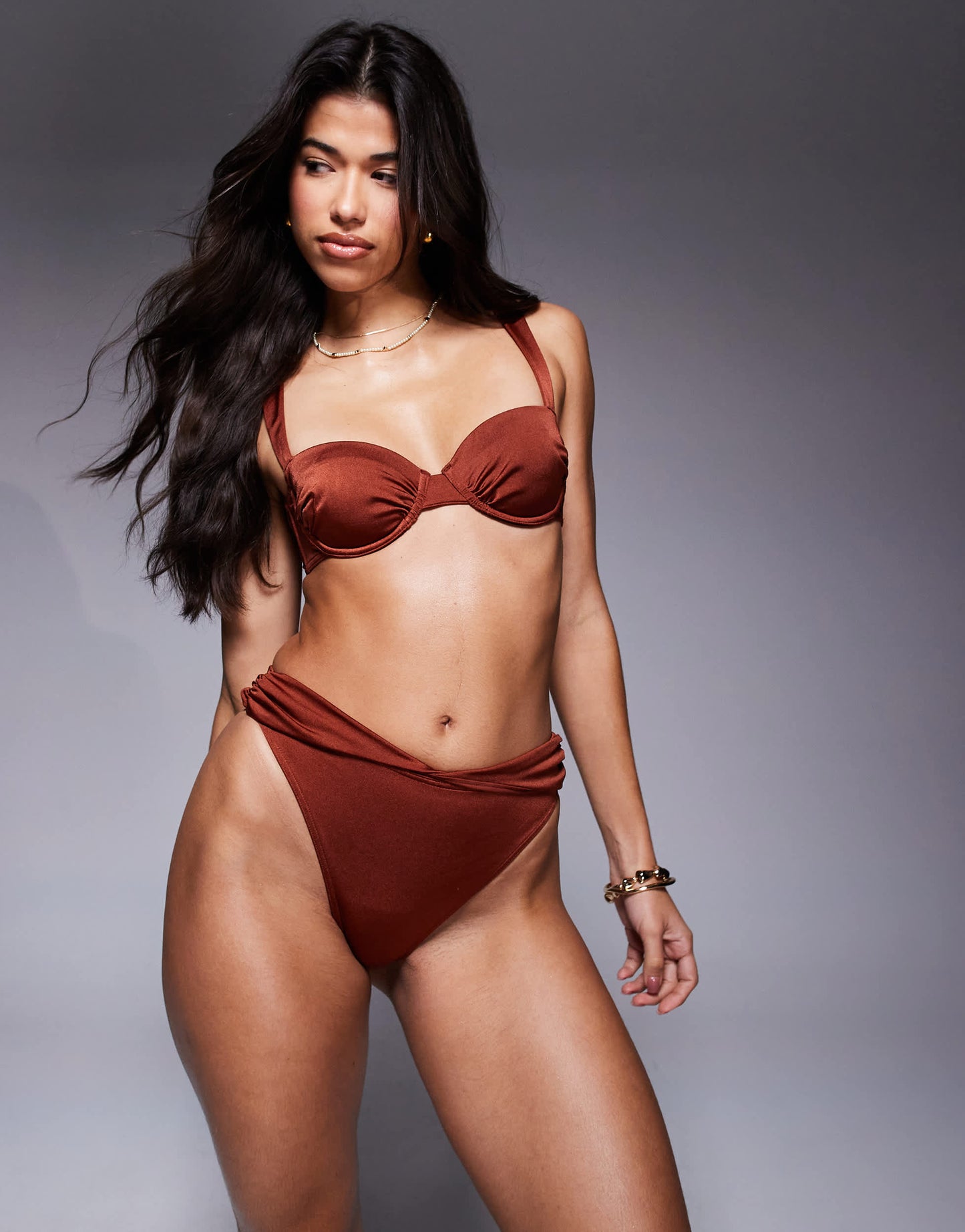 ASOS DESIGN Simone shine high leg high waist bikini bottom with twist waist panel in bronze