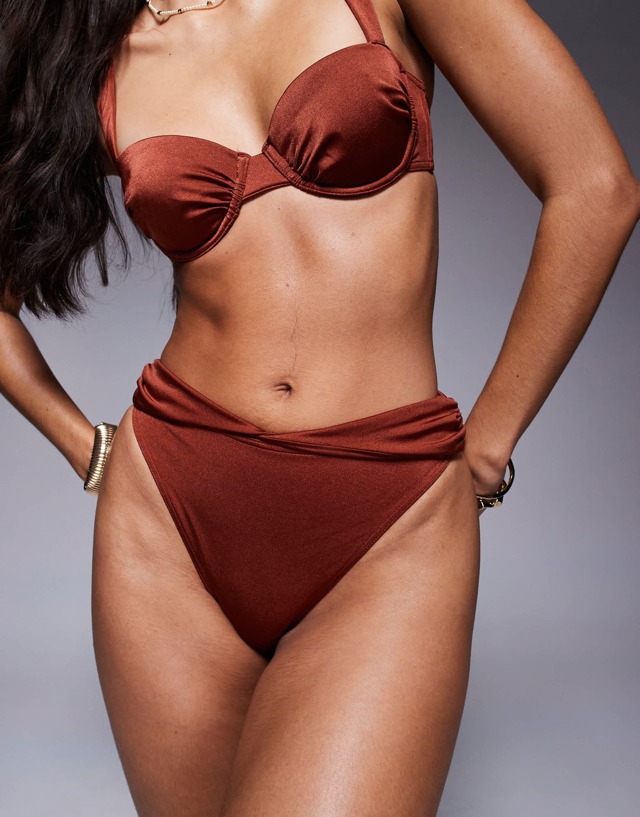 ASOS DESIGN Simone shine high leg high waist bikini bottom with twist waist panel in bronze