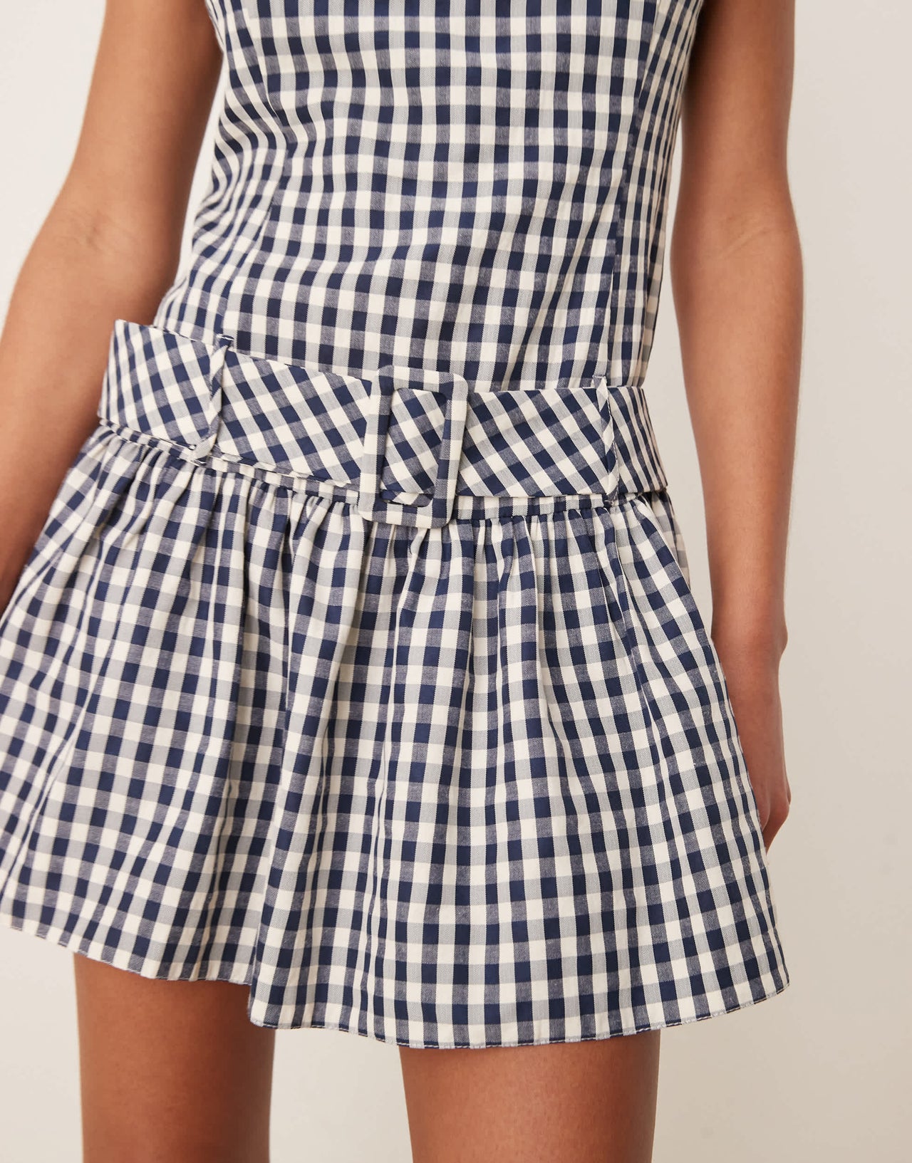 ASOS DESIGN drop waist belted mini in navy and white check