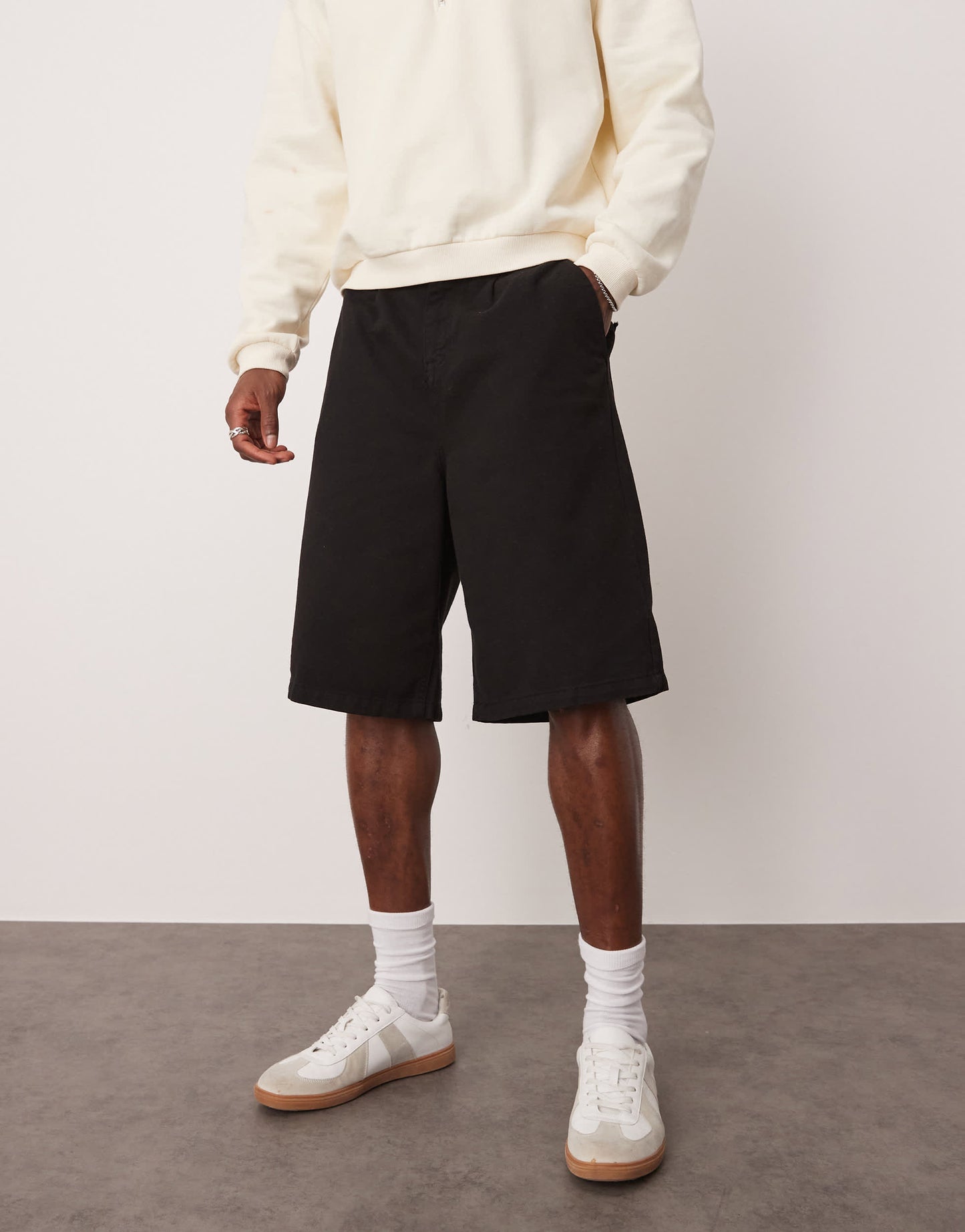 ASOS DESIGN long length pleated shorts in black