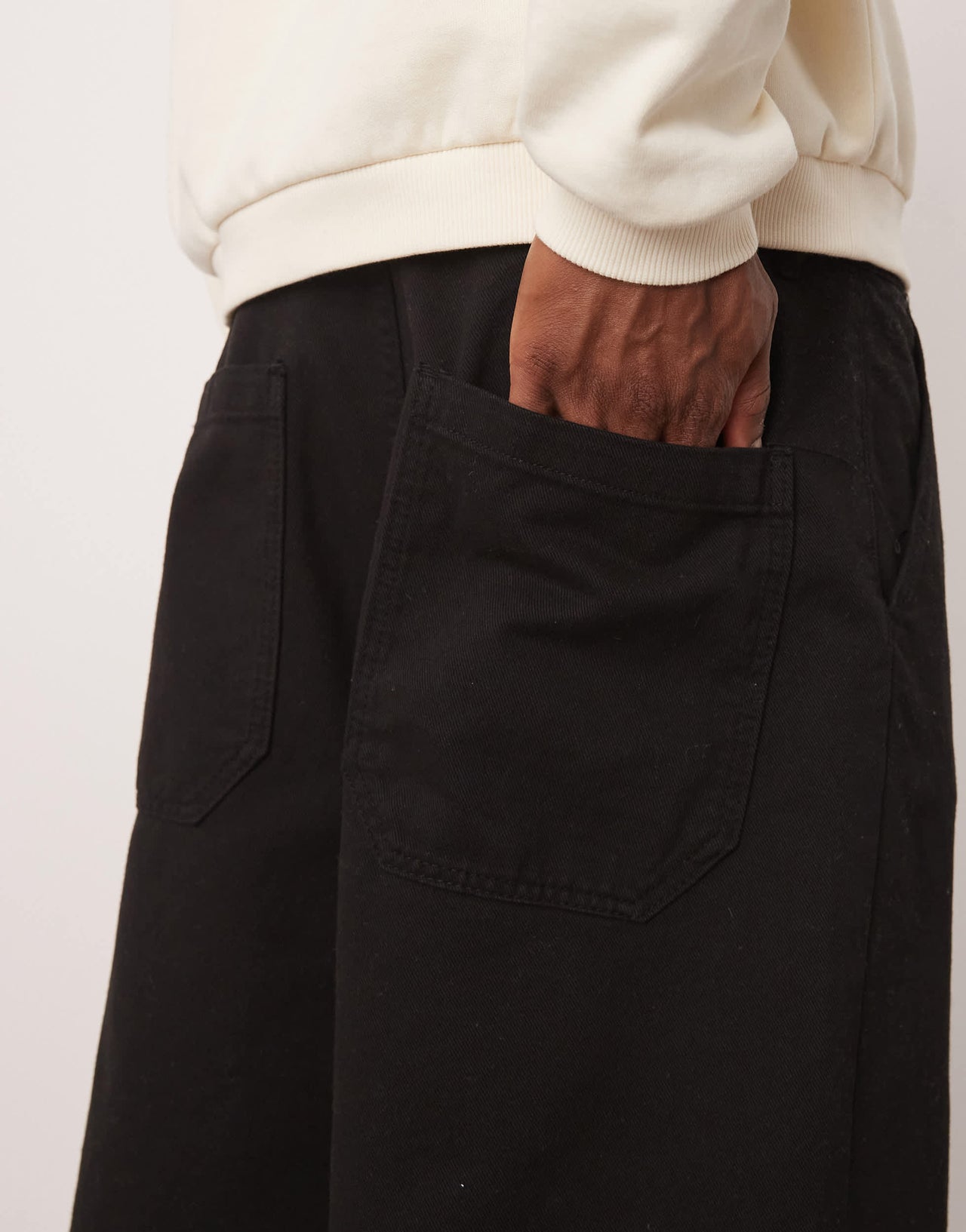 ASOS DESIGN long length pleated shorts in black