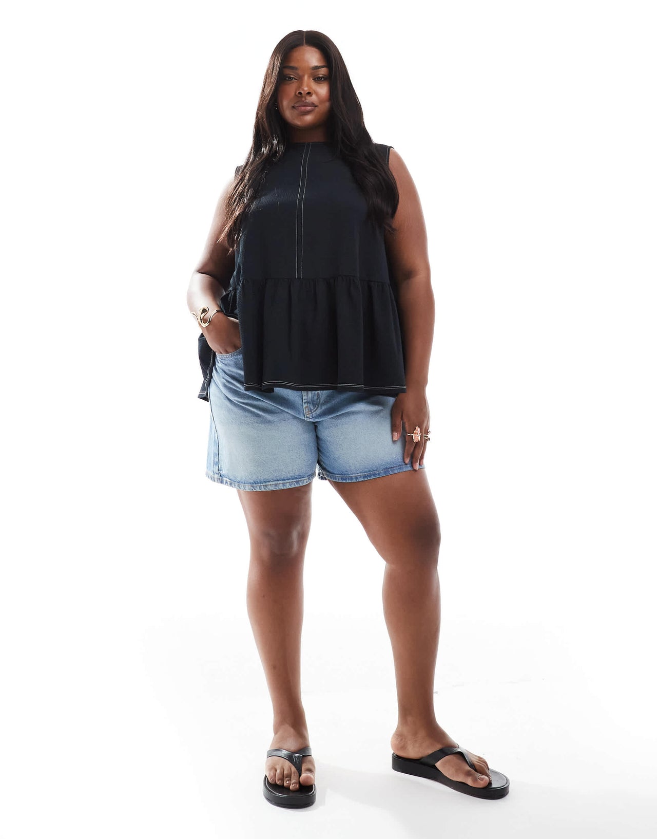 ASOS DESIGN Curve sleeveless peplum top with tie back in black