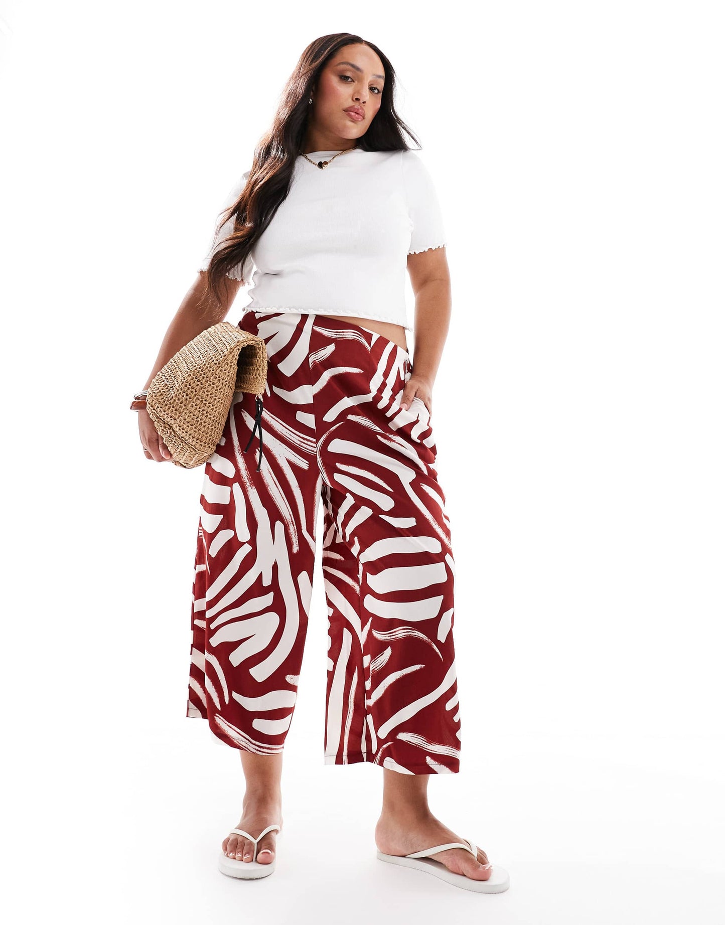 New Look Curve abstract print cropped trousers in brown