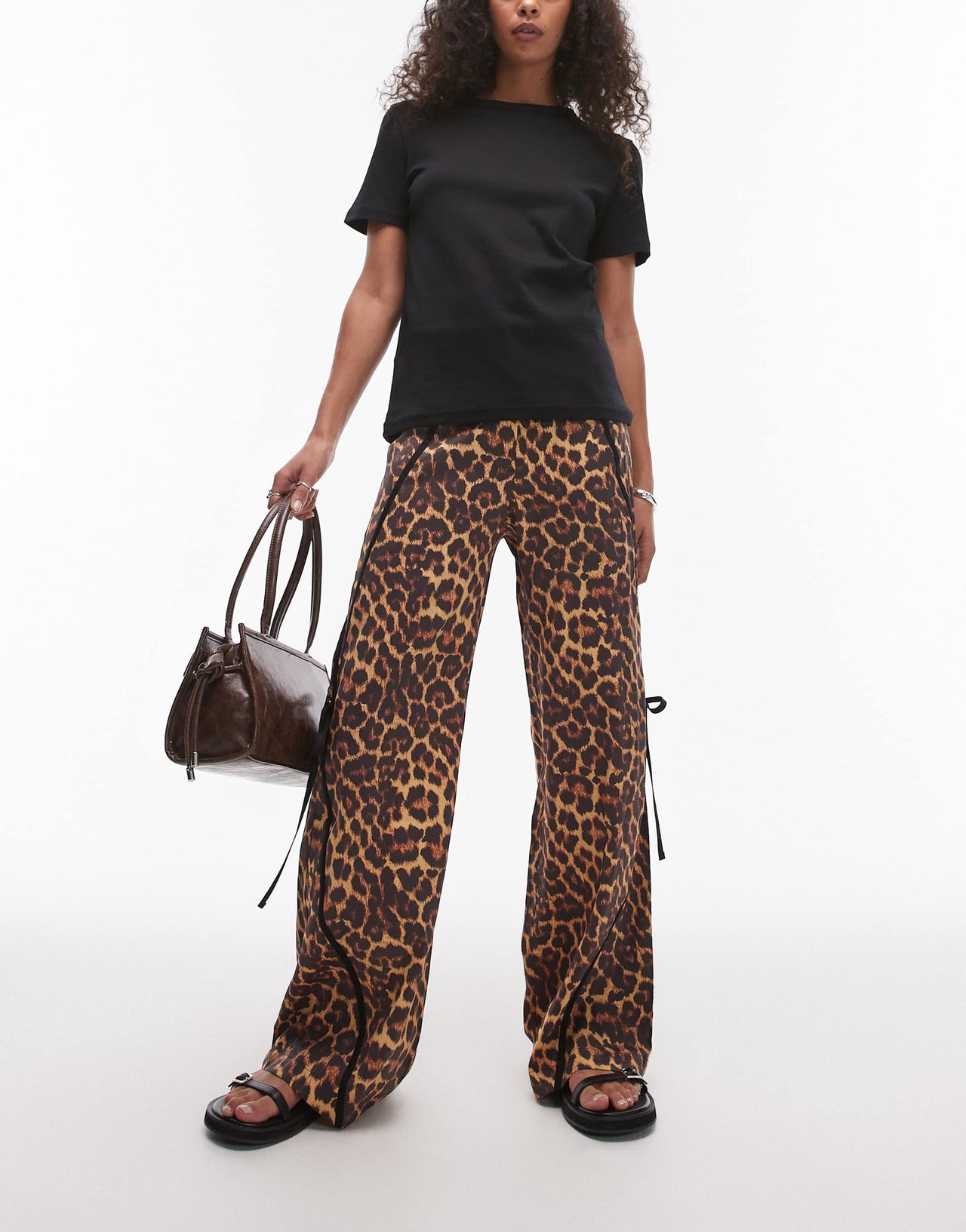 LAAGAM vicky leopard print mid rise tracksuit trousers with bow detail