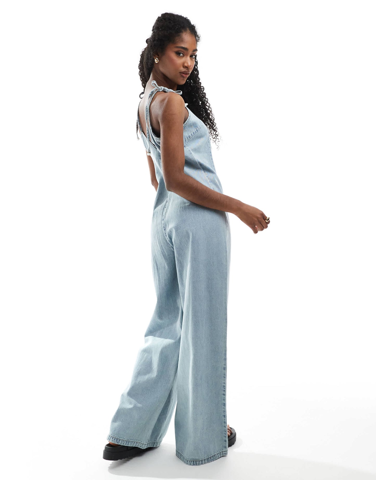 Monki lightweight denim halter neck jumpsuit in blue wash