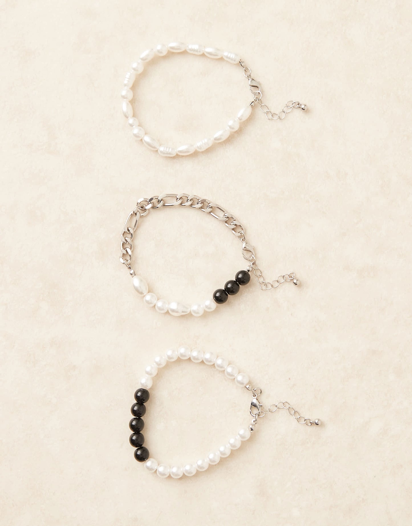 ASOS DESIGN festival mixed chain and beaded 3 pack bracelet in silver