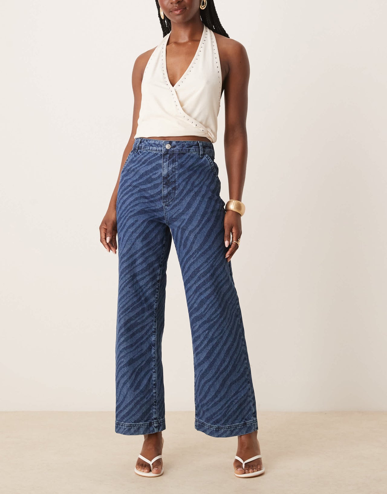 ASOS DESIGN wide leg cropped jean with zebra laser in mid blue