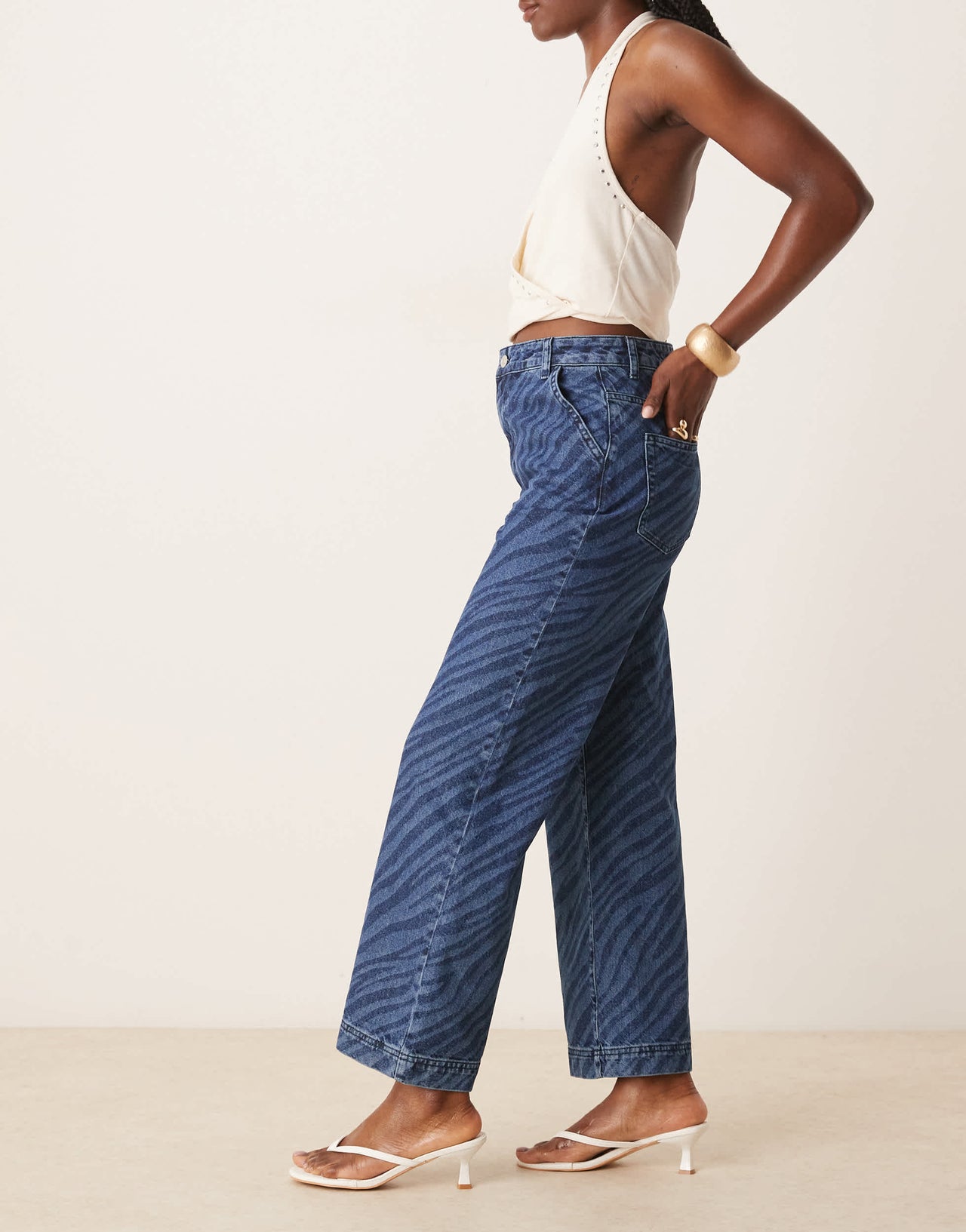 ASOS DESIGN wide leg cropped jean with zebra laser in mid blue