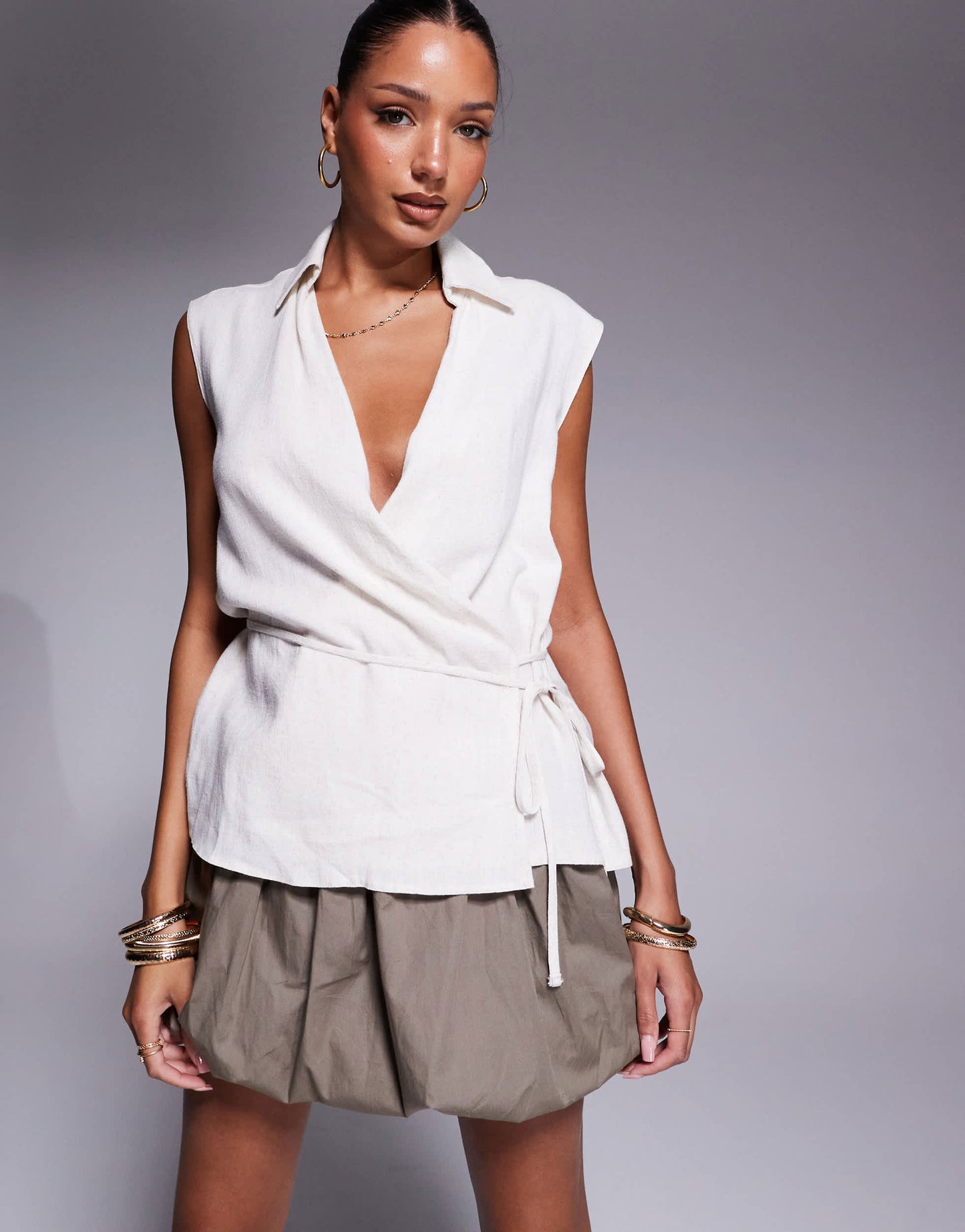 ASOS DESIGN linen look wrap over sleeveless blouse in cream