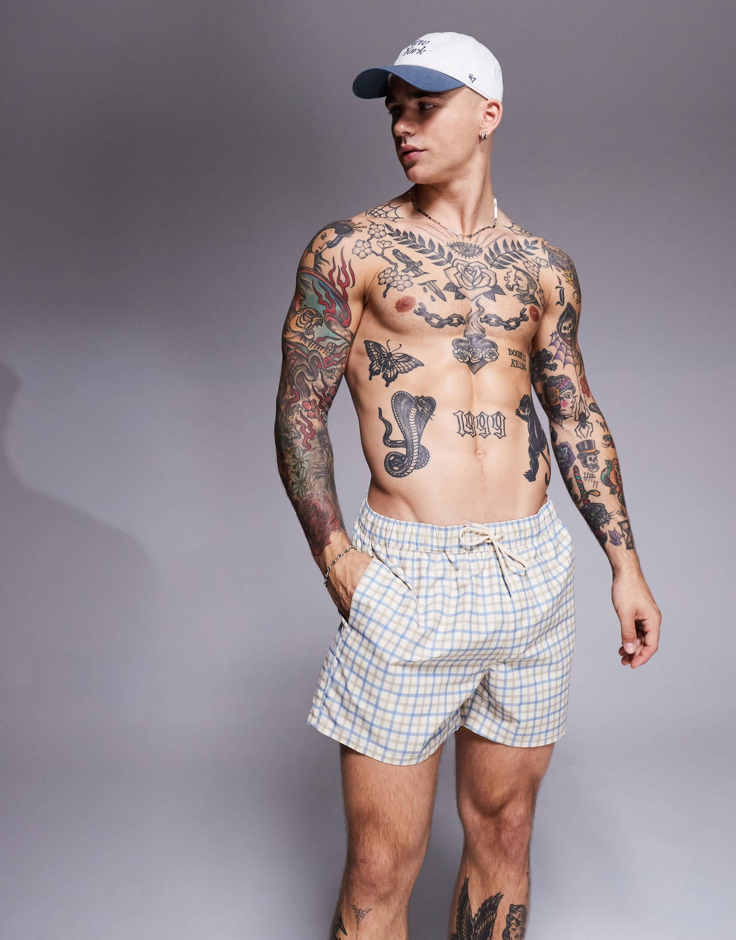 ASOS DESIGN swim shorts in mid length in blue check