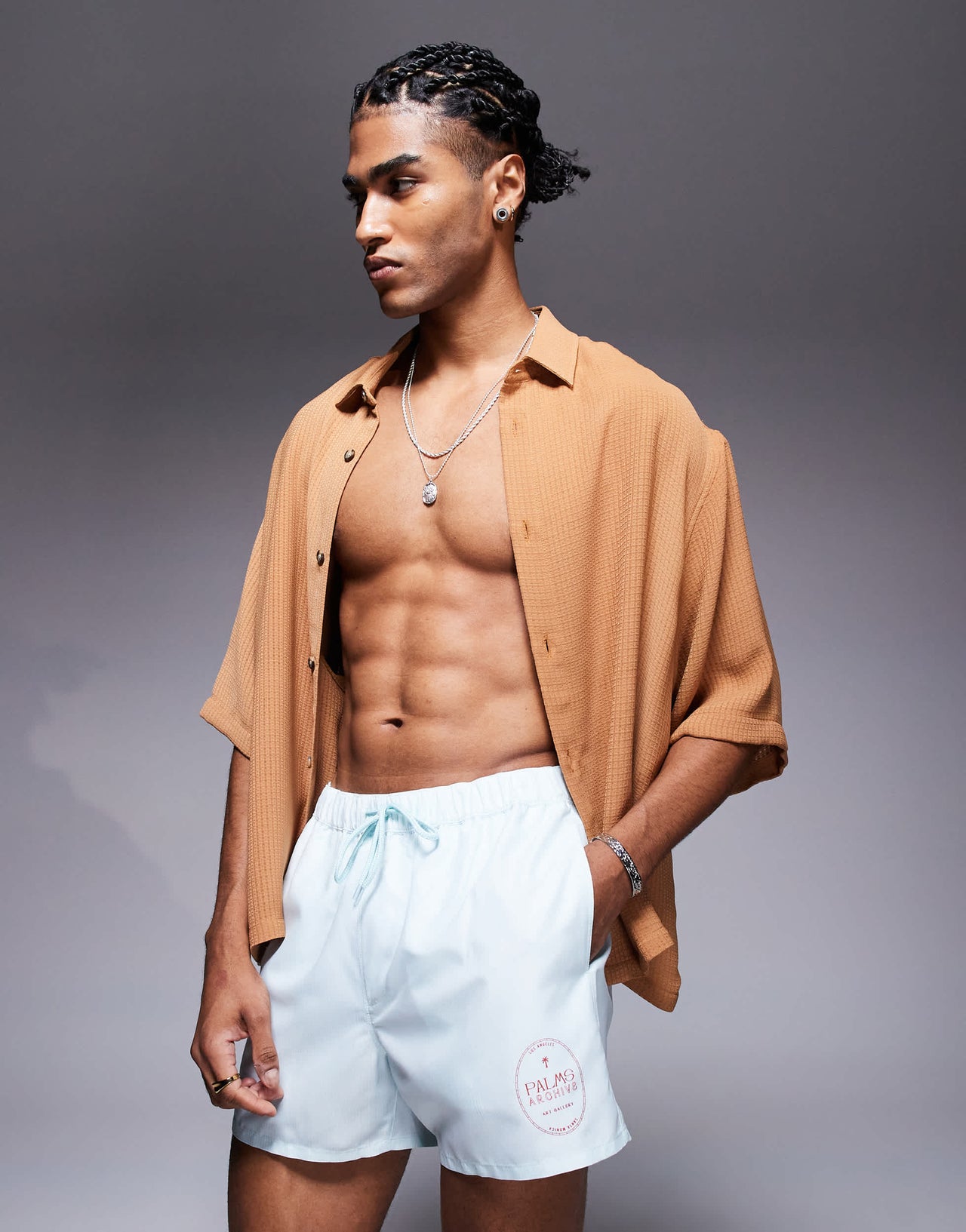 ASOS DESIGN swim shorts in short length in blue and white stripe