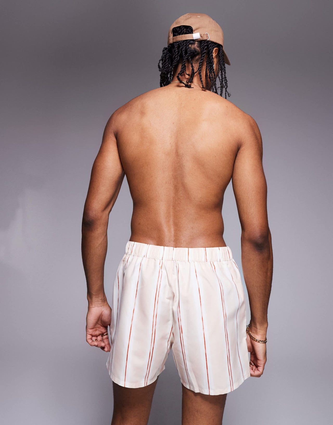 ASOS DESIGN swim shorts in short length in pink textured stripe