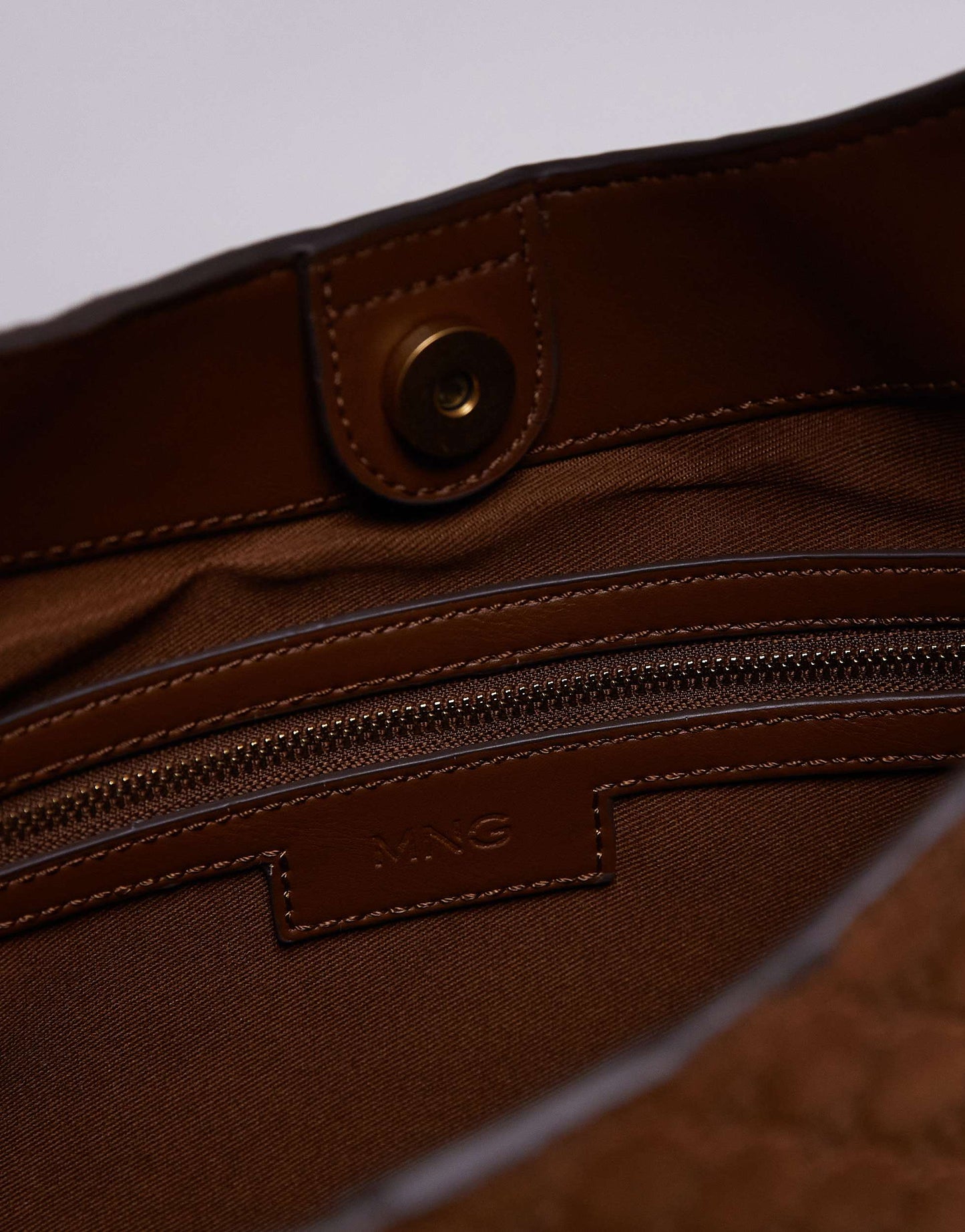 Mango embossed monogram leather bag in brown