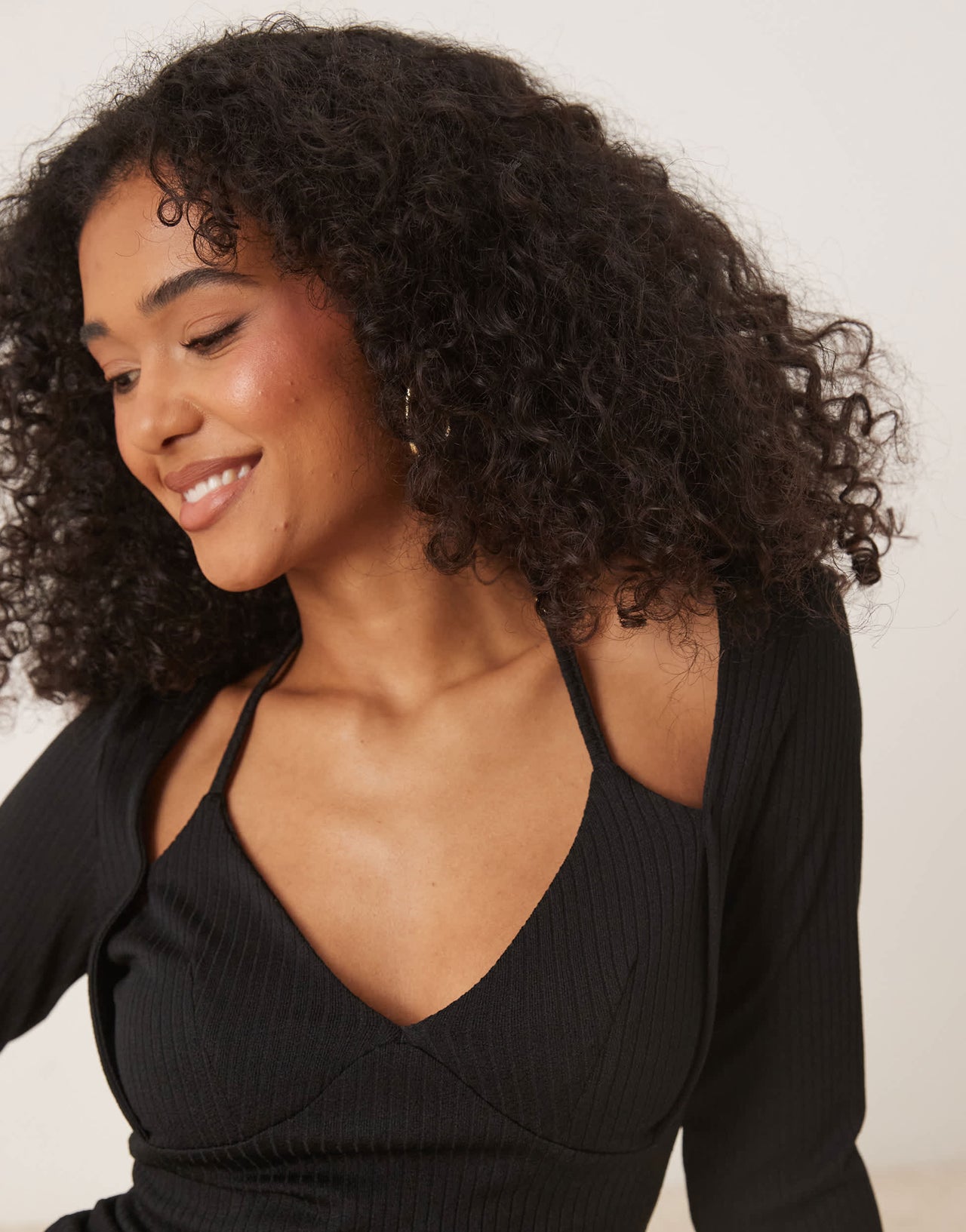 ASOS DESIGN rib halter neck long sleeve top in black