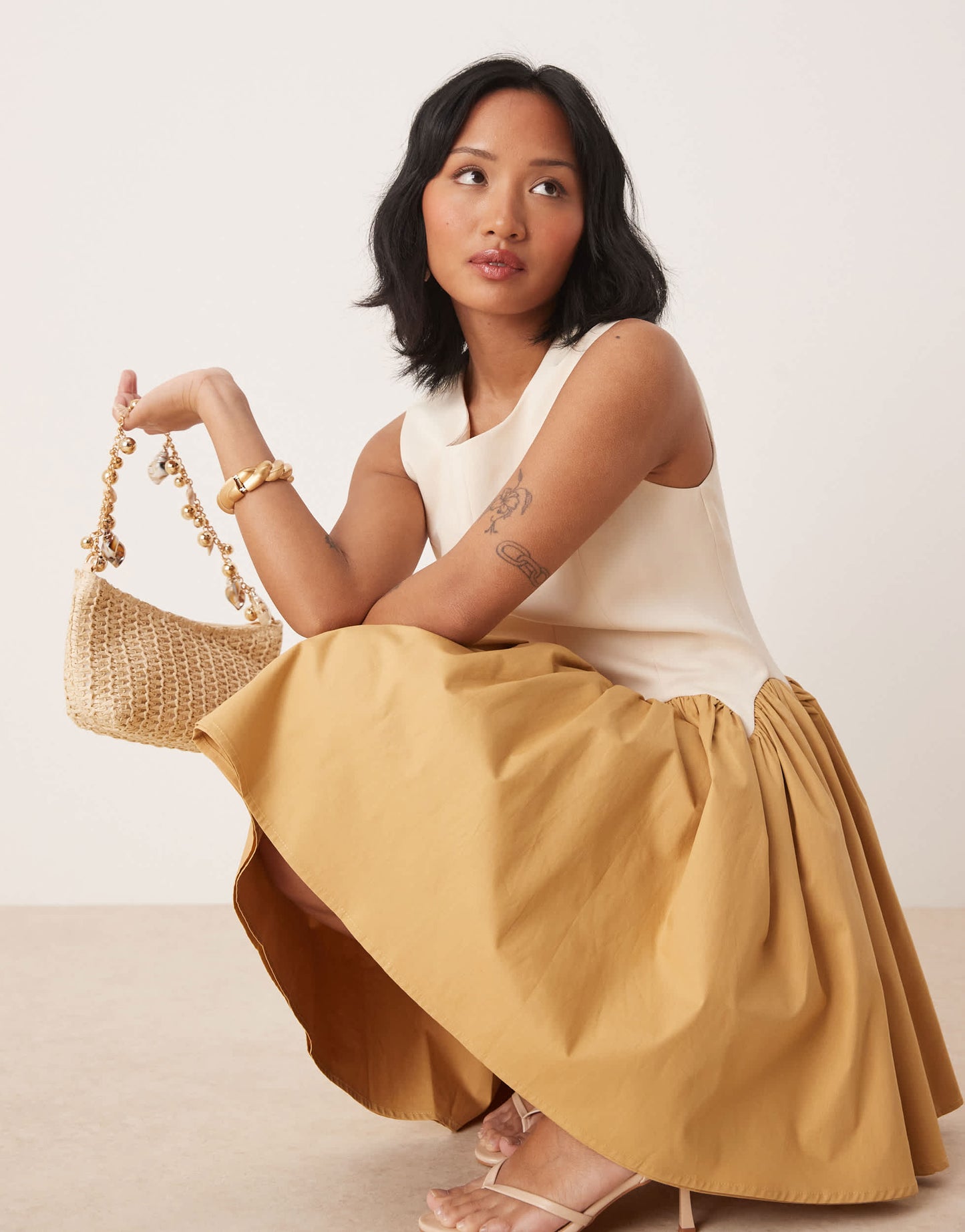 Never Fully Dressed Petite contrast drop hem mini dress in camel