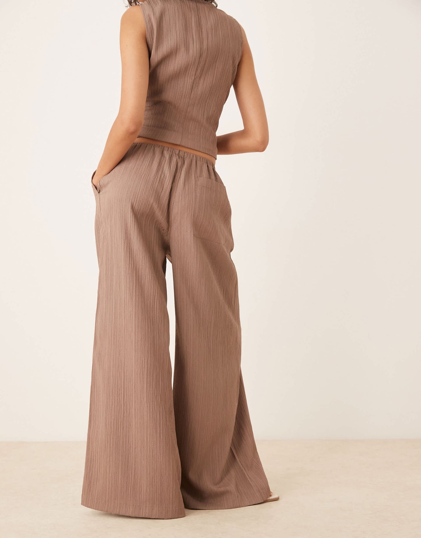 ASOS DESIGN crinkle palazzo trousers co-ord in taupe