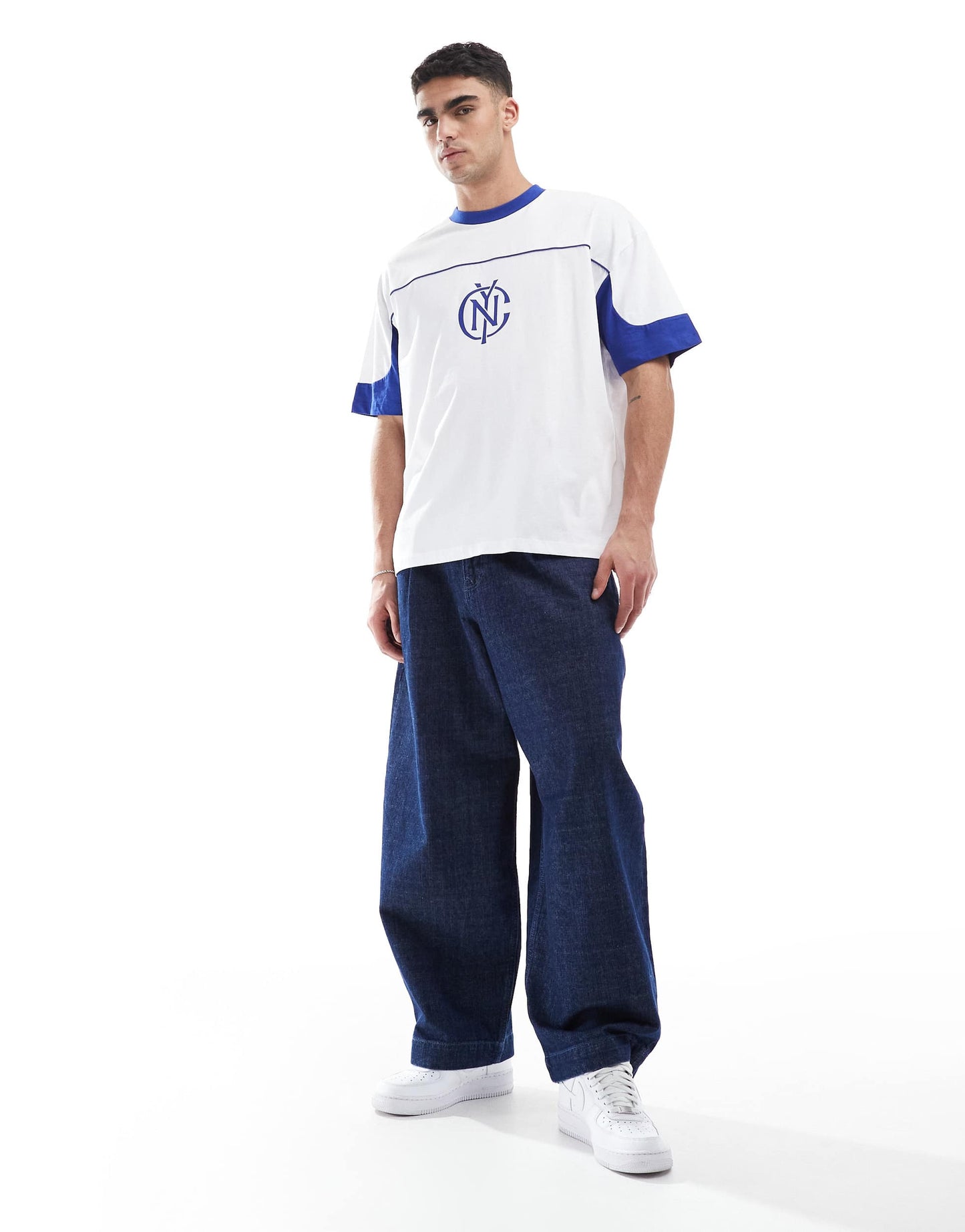 ASOS DESIGN oversized t-shirt with panelling and sports graphic in white