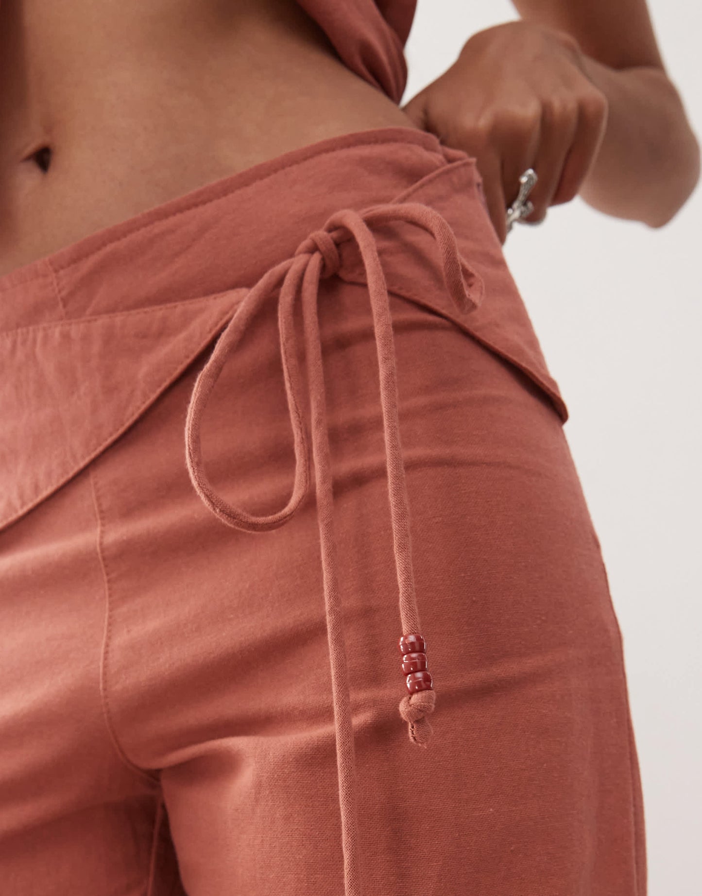 Motel cursa sarong overlay bead detail linen trousers in tuscan red
