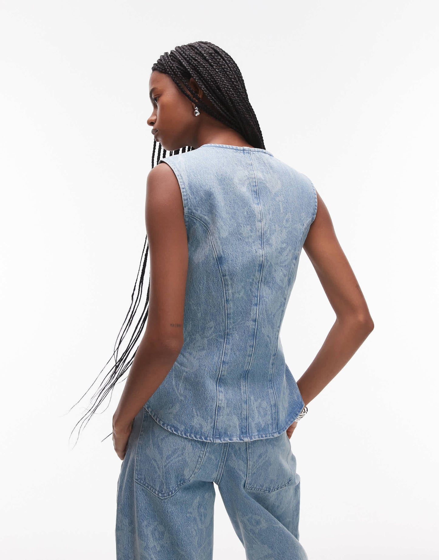 ASOS DESIGN denim cinch waistcoat in floral mid wash blue