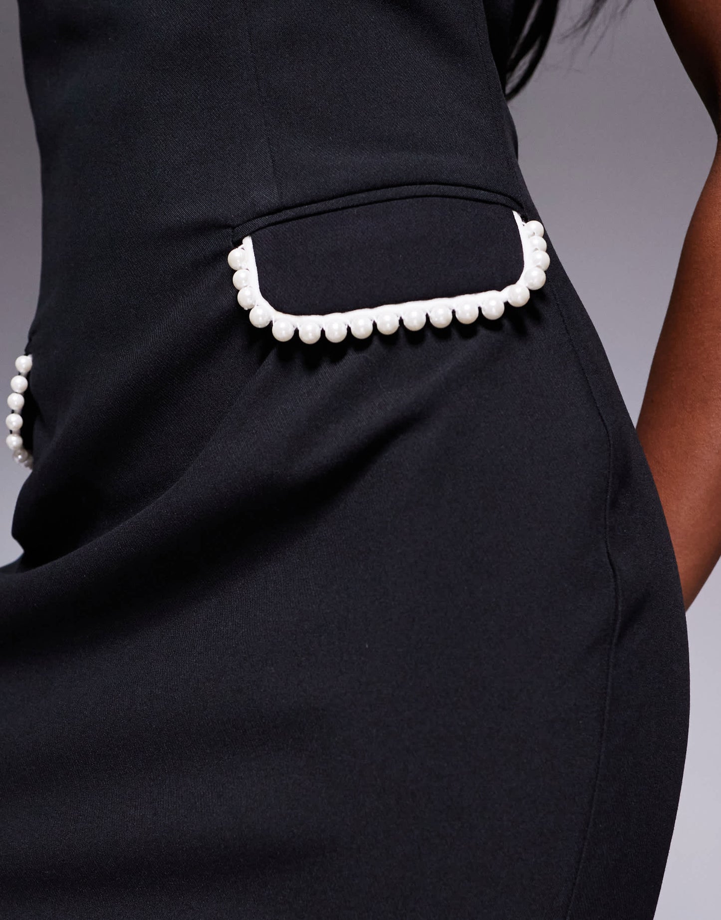 Rare London structured bandeau pearl pocket detail mini dress in black