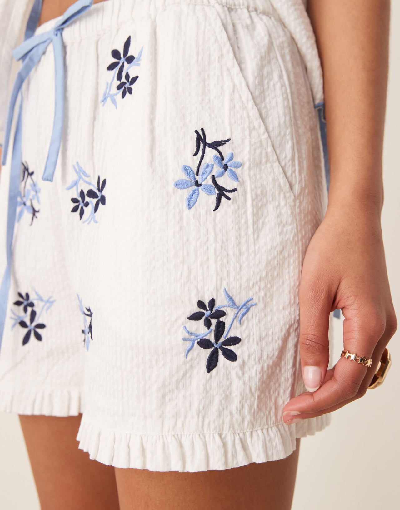 Neon Rose embroidered tie-front shorts co-ord in white and blue