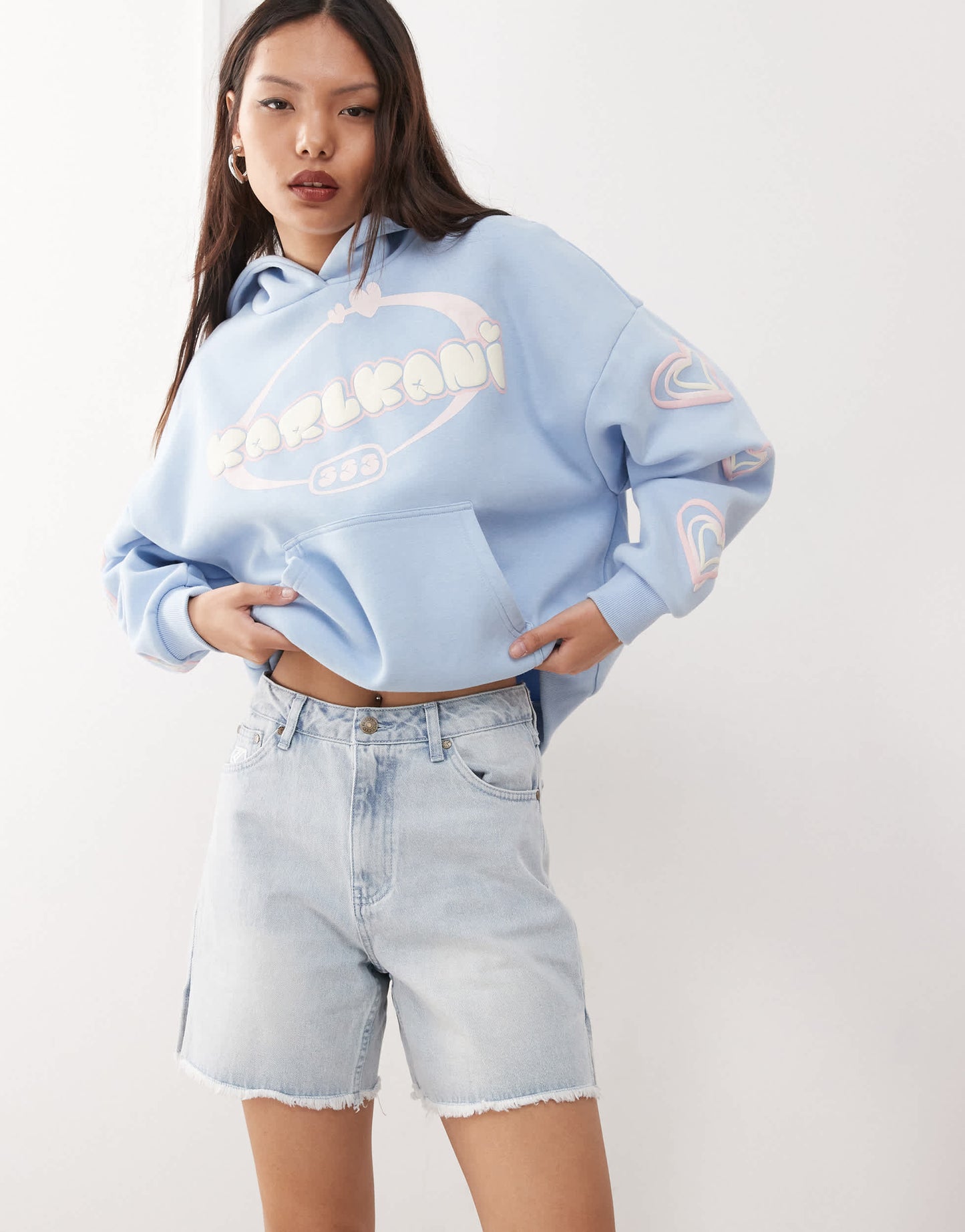 Karl Kani OG slit denim shorts in light wash blue