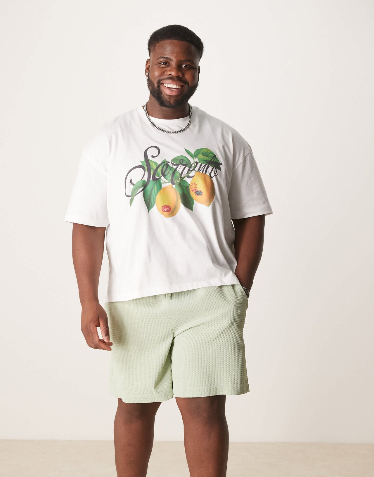 ASOS DESIGN mid length waffle short in green