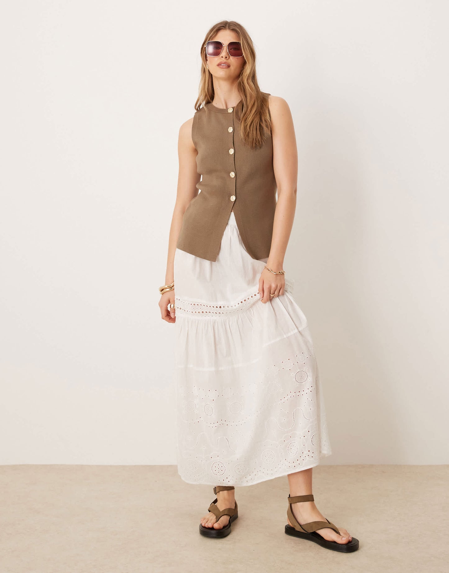 ASOS DESIGN knitted crew neck structured waistcoat with gold buttons in mocha