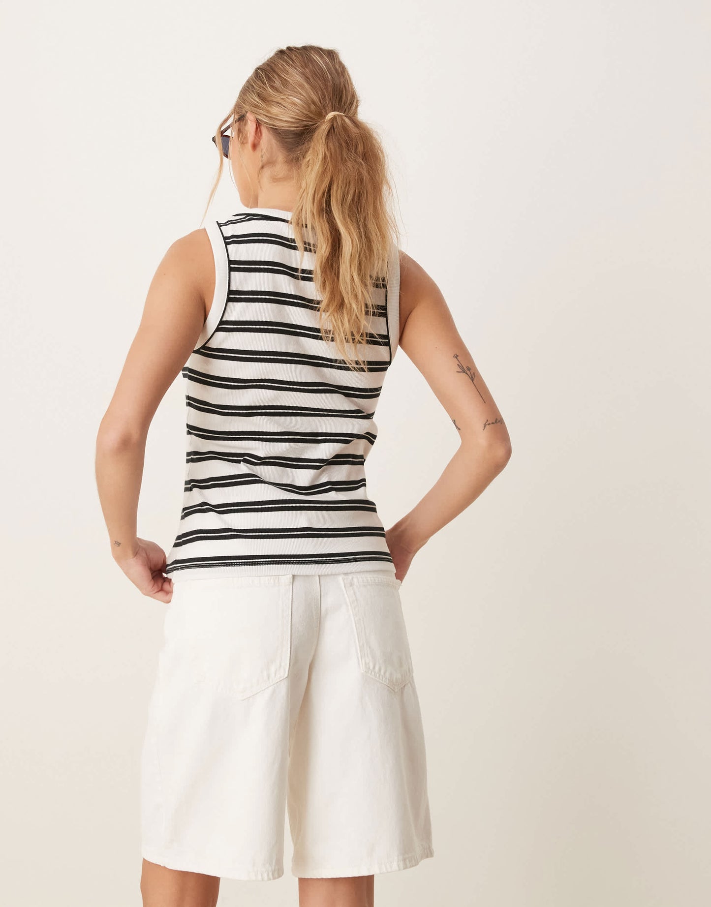 AWARE ribbed knit tank top in black and white stripe