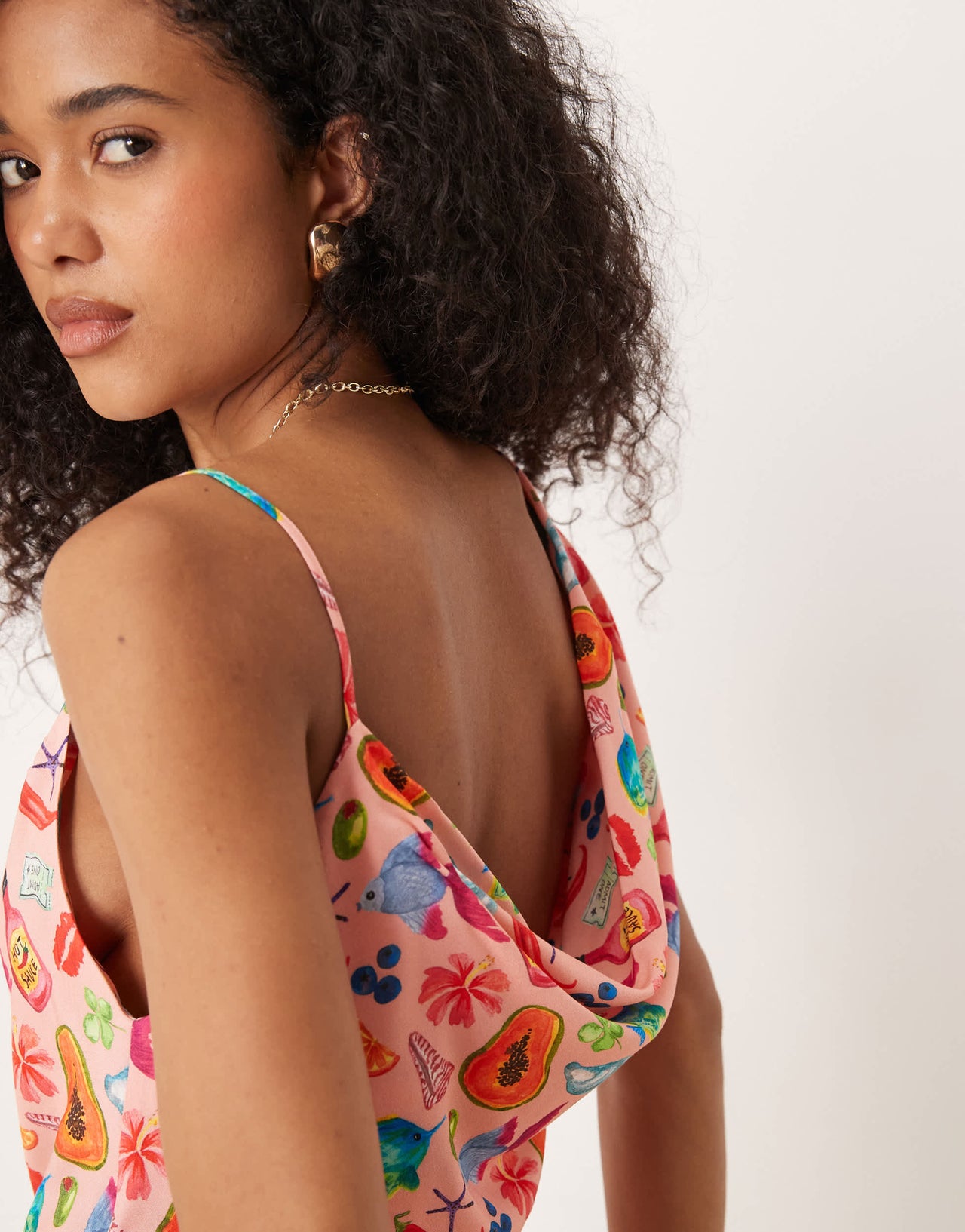 ASOS DESIGN asymmetric cowl neck mini dress in pink postcard print