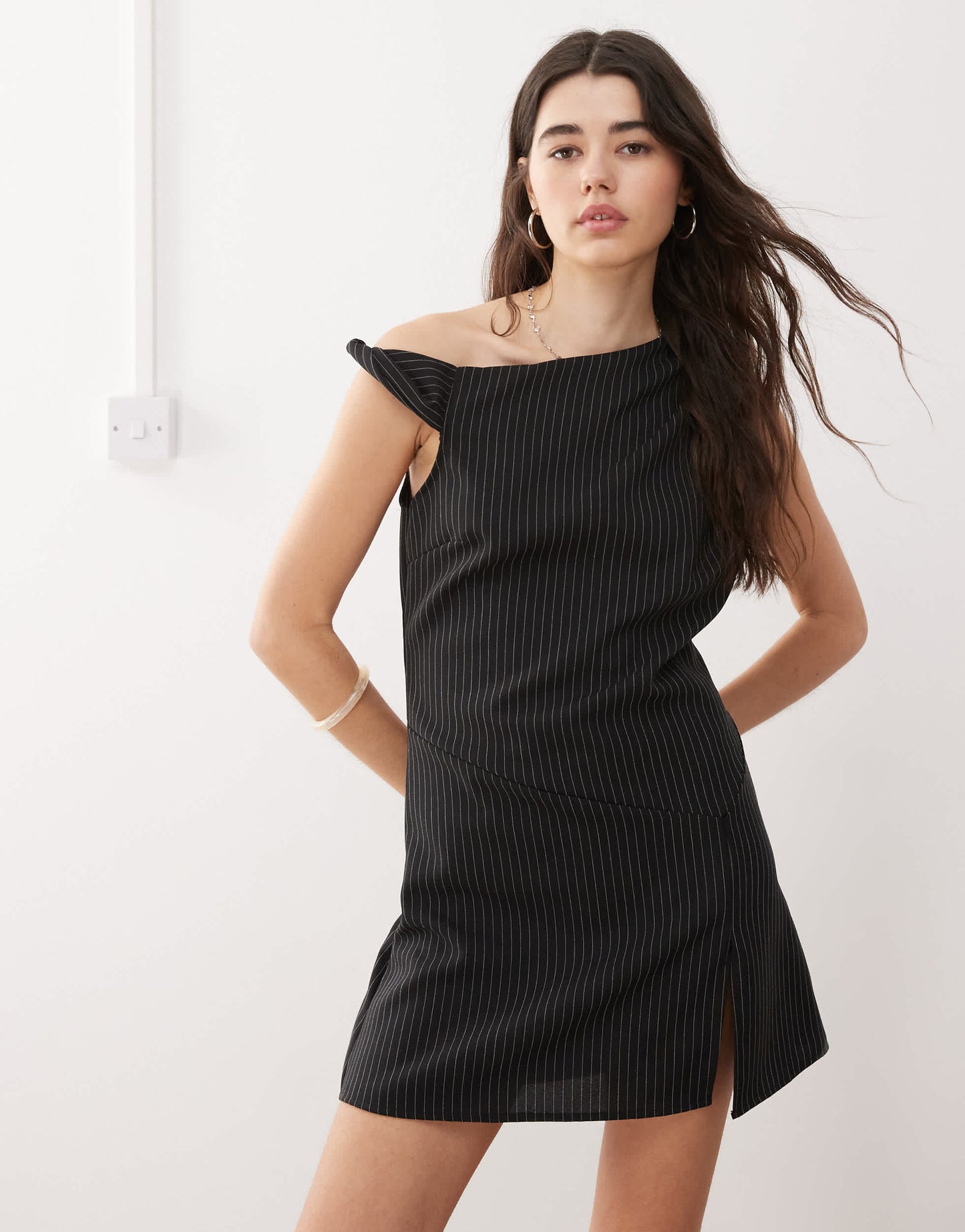 Reclaimed Vintage tailored structured mini skort dress with one shoulder detail in black pinstripe - BLACK