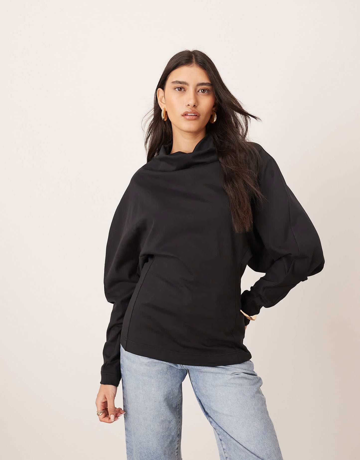 ARRANGE sculptural jersey longline top in black