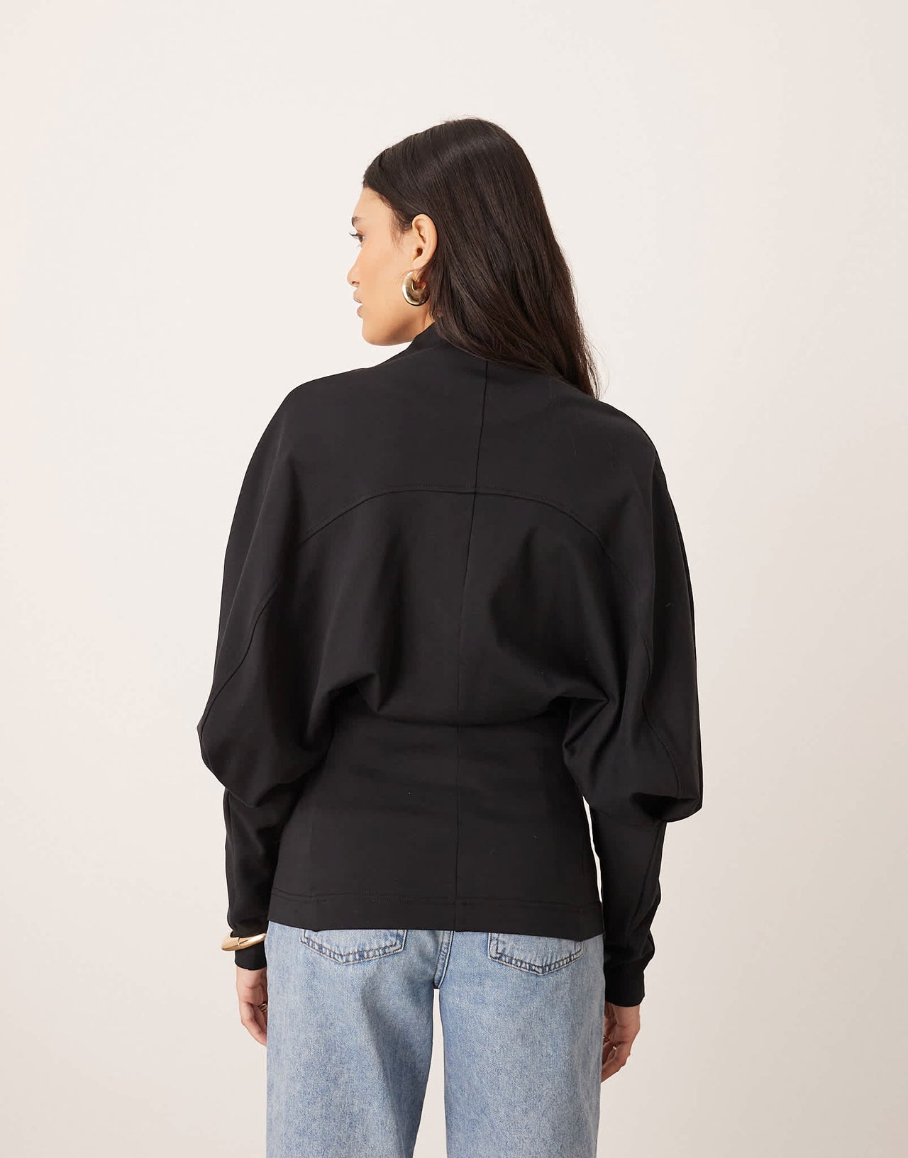 ARRANGE sculptural jersey longline top in black