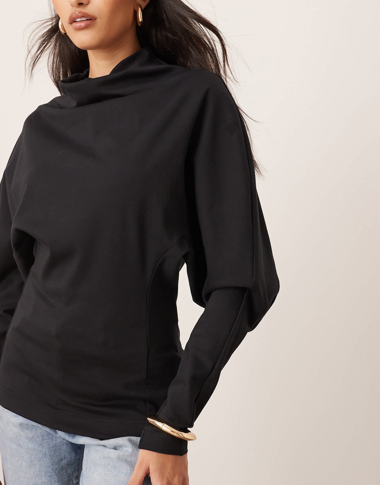 ARRANGE sculptural jersey longline top in black