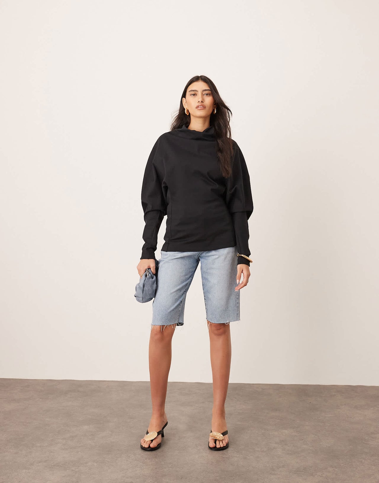 ARRANGE sculptural jersey longline top in black