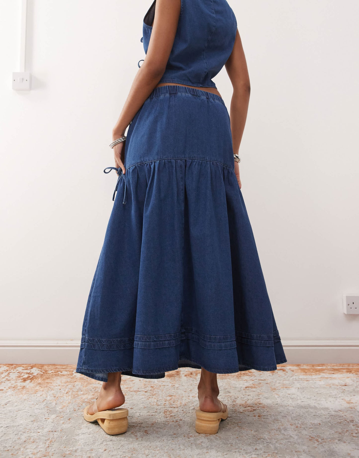 Reclaimed Vintage denim prairie skirt co-ord with bow detail