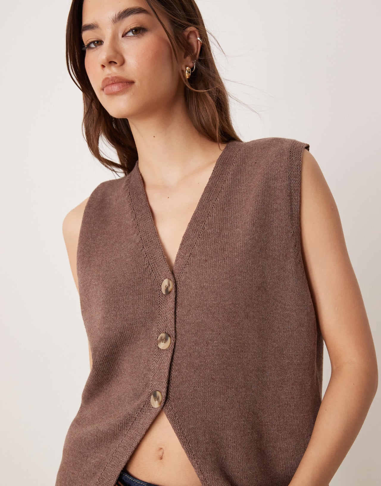 ASOS DESIGN clean knitted relaxed fit waistcoat in chocolate
