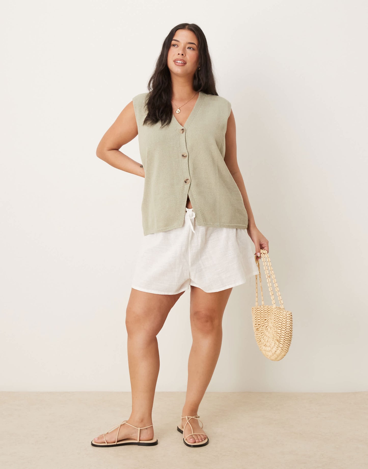 ASOS DESIGN Curve clean knitted relaxed fit waistcoat in khaki