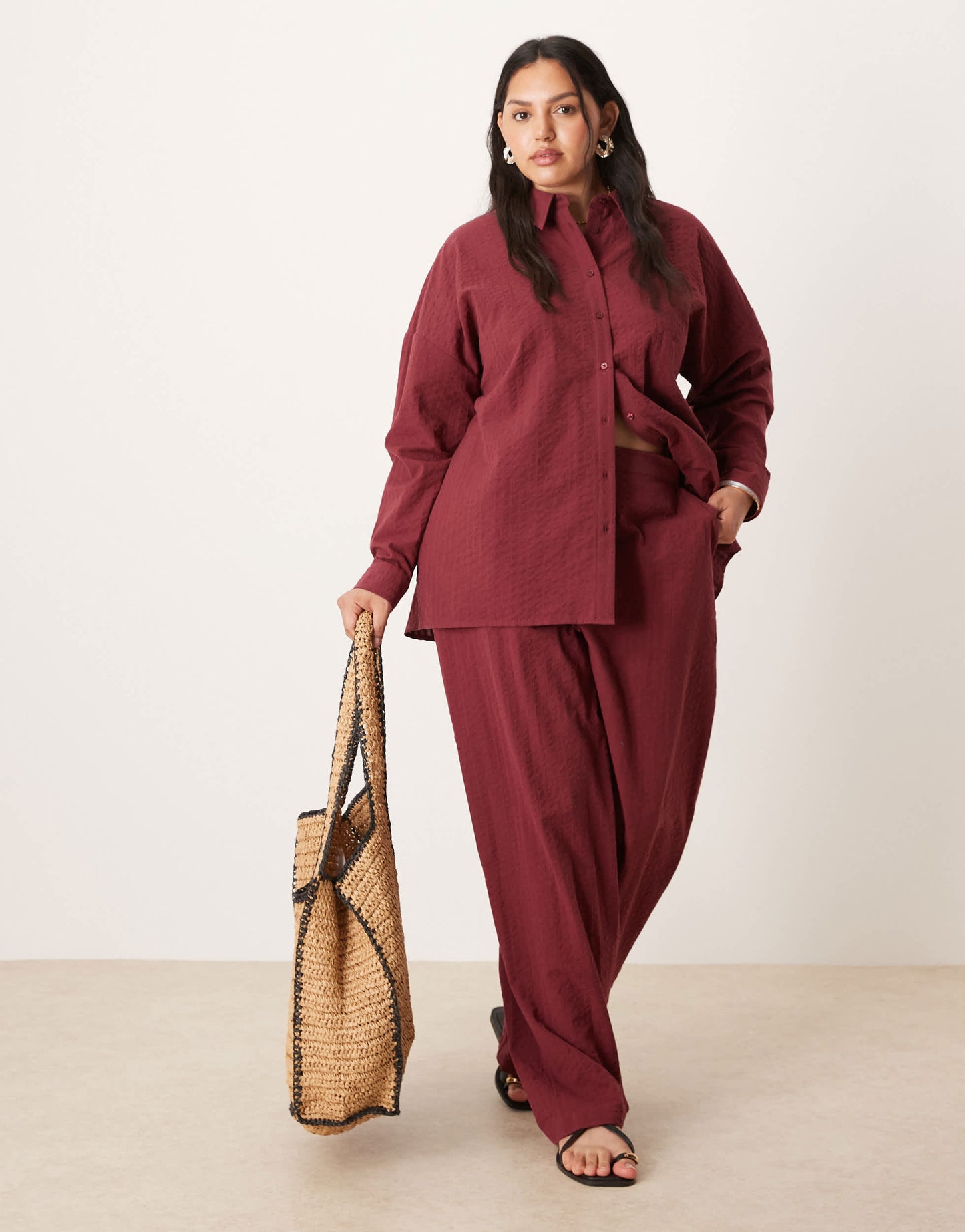 ASOS DESIGN Curve seersucker relaxed pull on trousers co-ord in burgundy