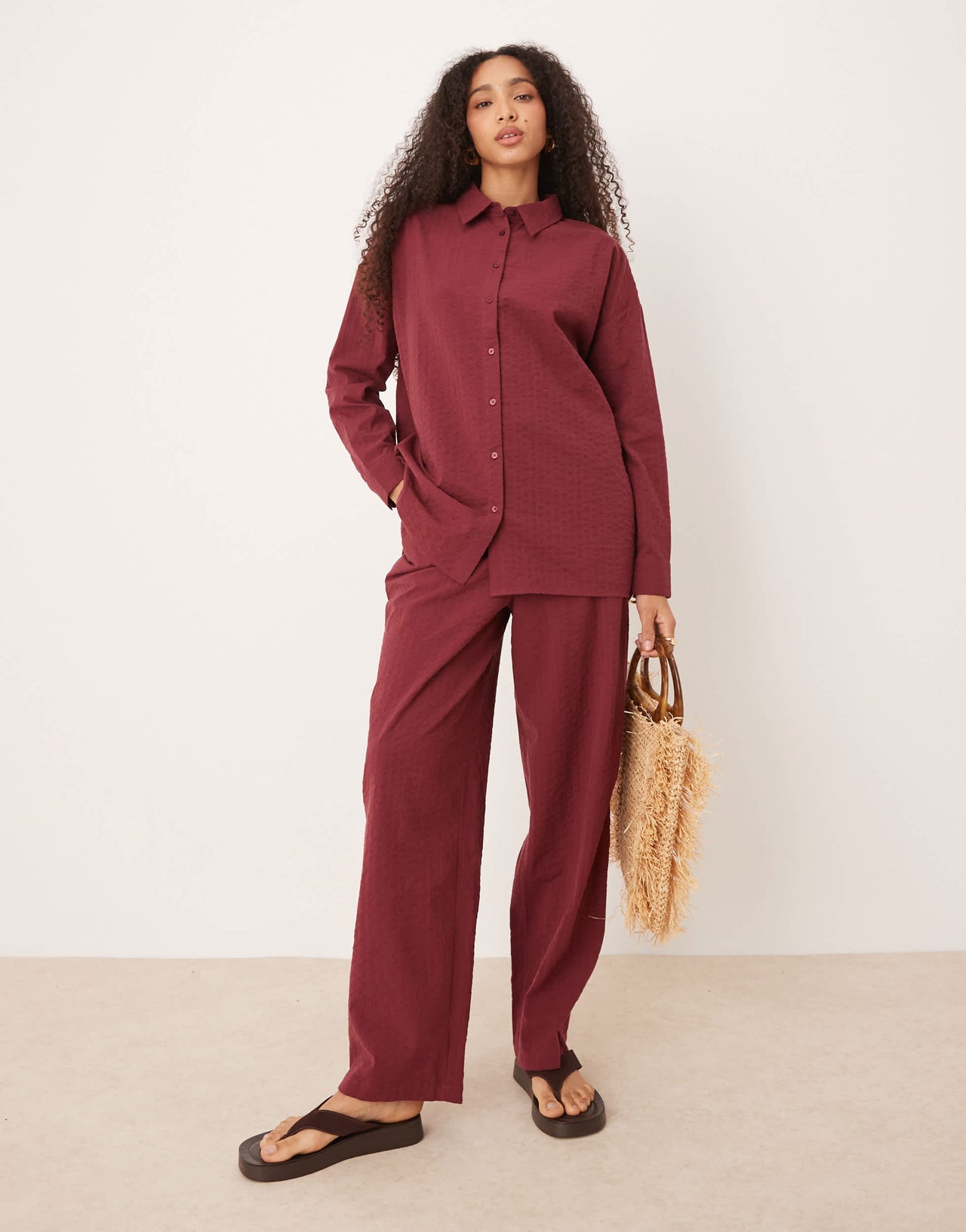 ASOS DESIGN seersucker relaxed pull on trousers co-ord in burgundy