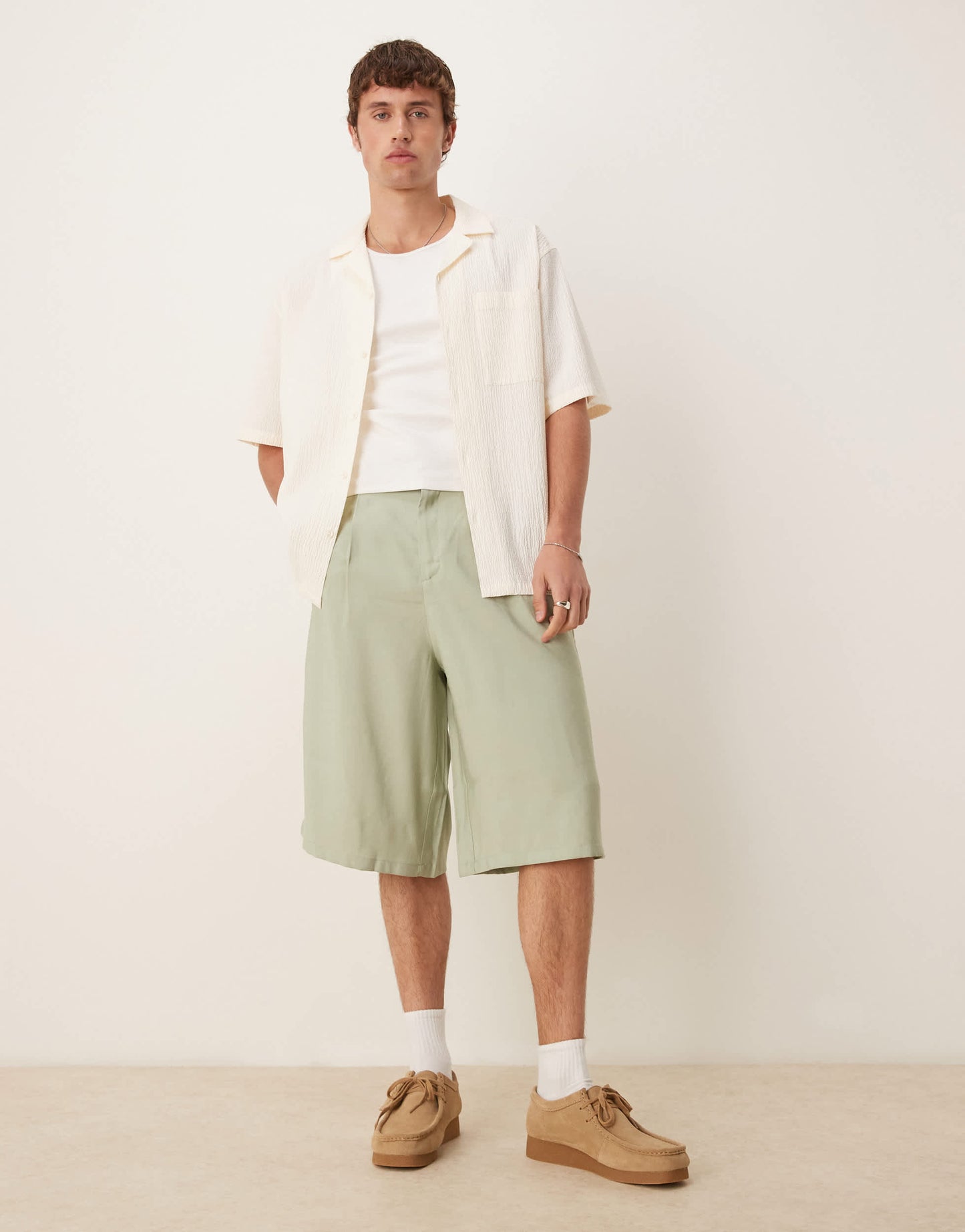 ASOS DESIGN oversized bemuda shorts with pleat details in sage