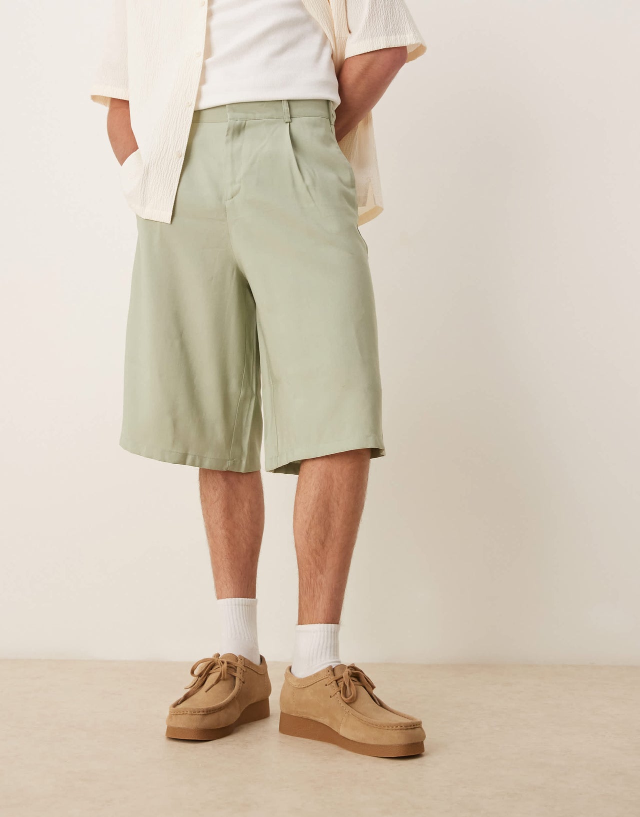 ASOS DESIGN oversized bemuda shorts with pleat details in sage