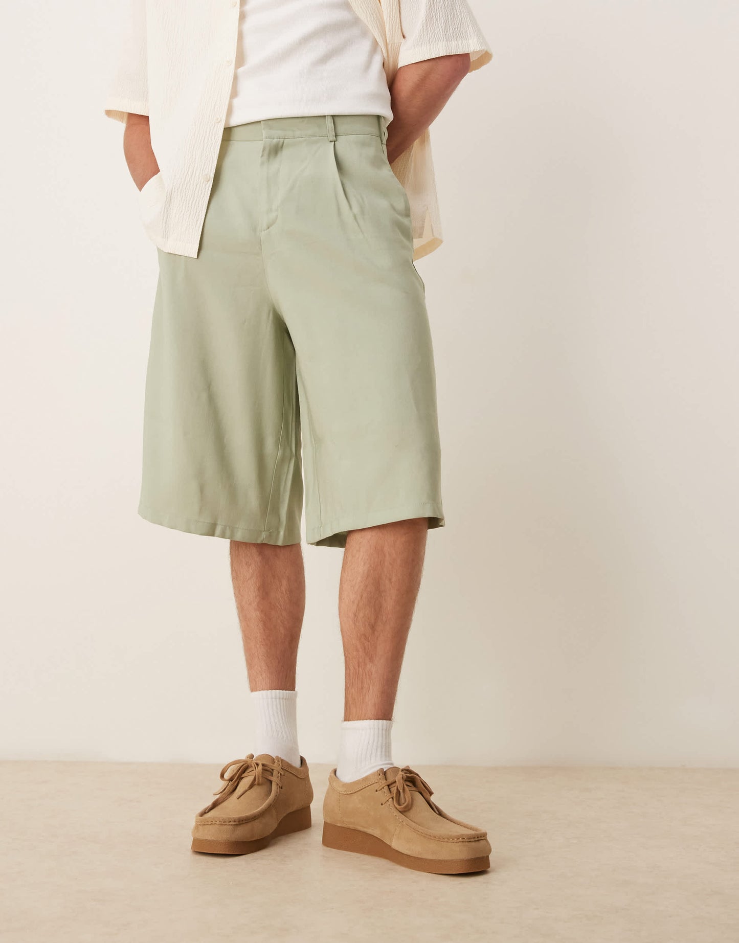 ASOS DESIGN oversized bemuda shorts with pleat details in sage
