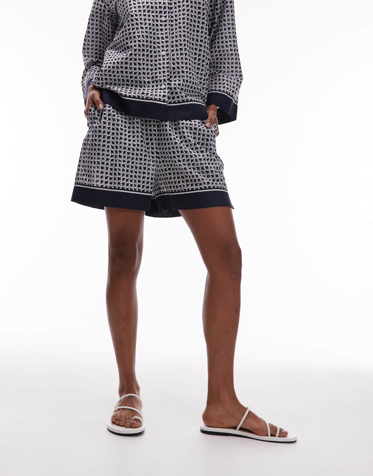 ARKET loose fit beach shorts with pull-on waist in blue abstract tile print