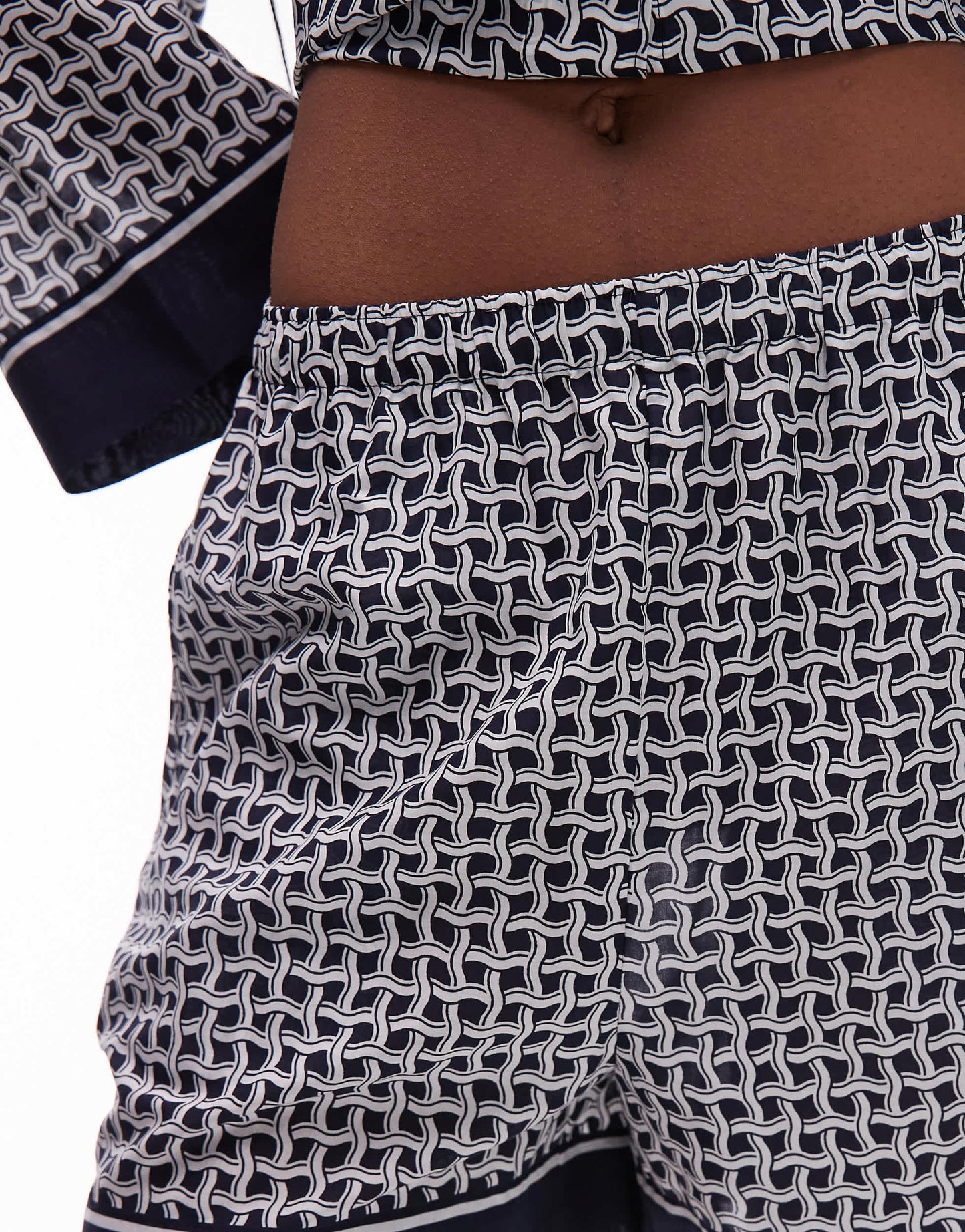 ARKET loose fit beach shorts with pull-on waist in blue abstract tile print