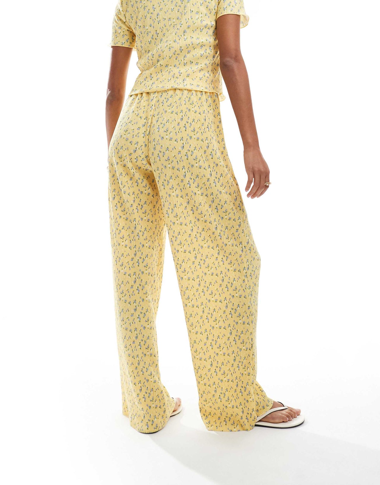 Pieces mini plisse wide leg trouser co-ord in ditsy yellow flower print