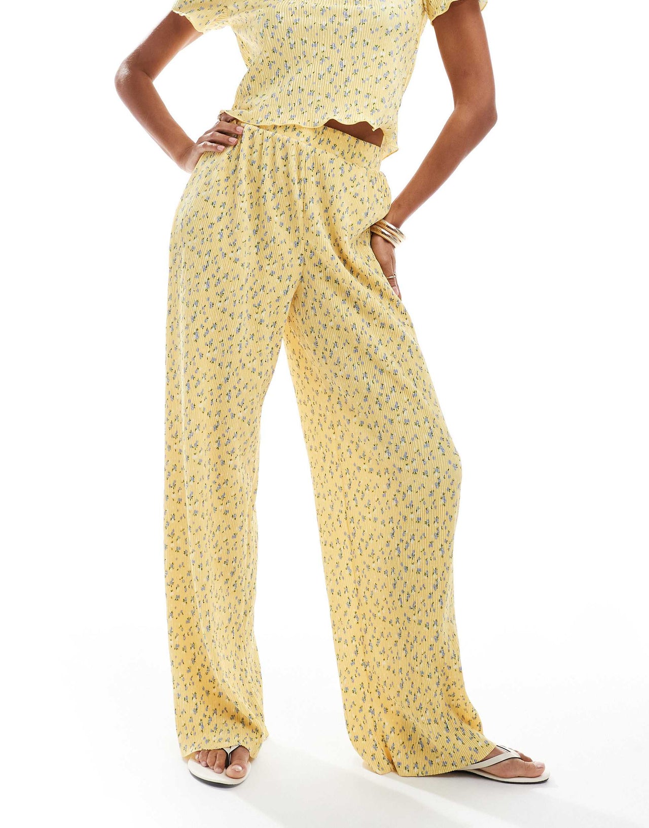 Pieces mini plisse wide leg trouser co-ord in ditsy yellow flower print