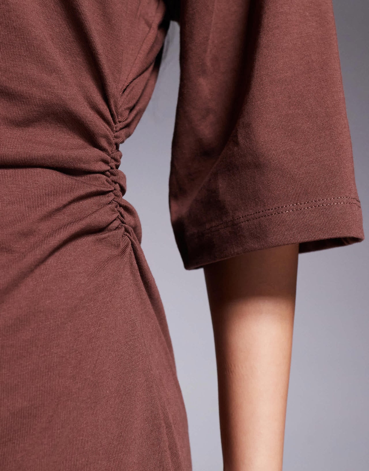 ASOS DESIGN cinched t-shirt mini dress with shoulder pads in brown