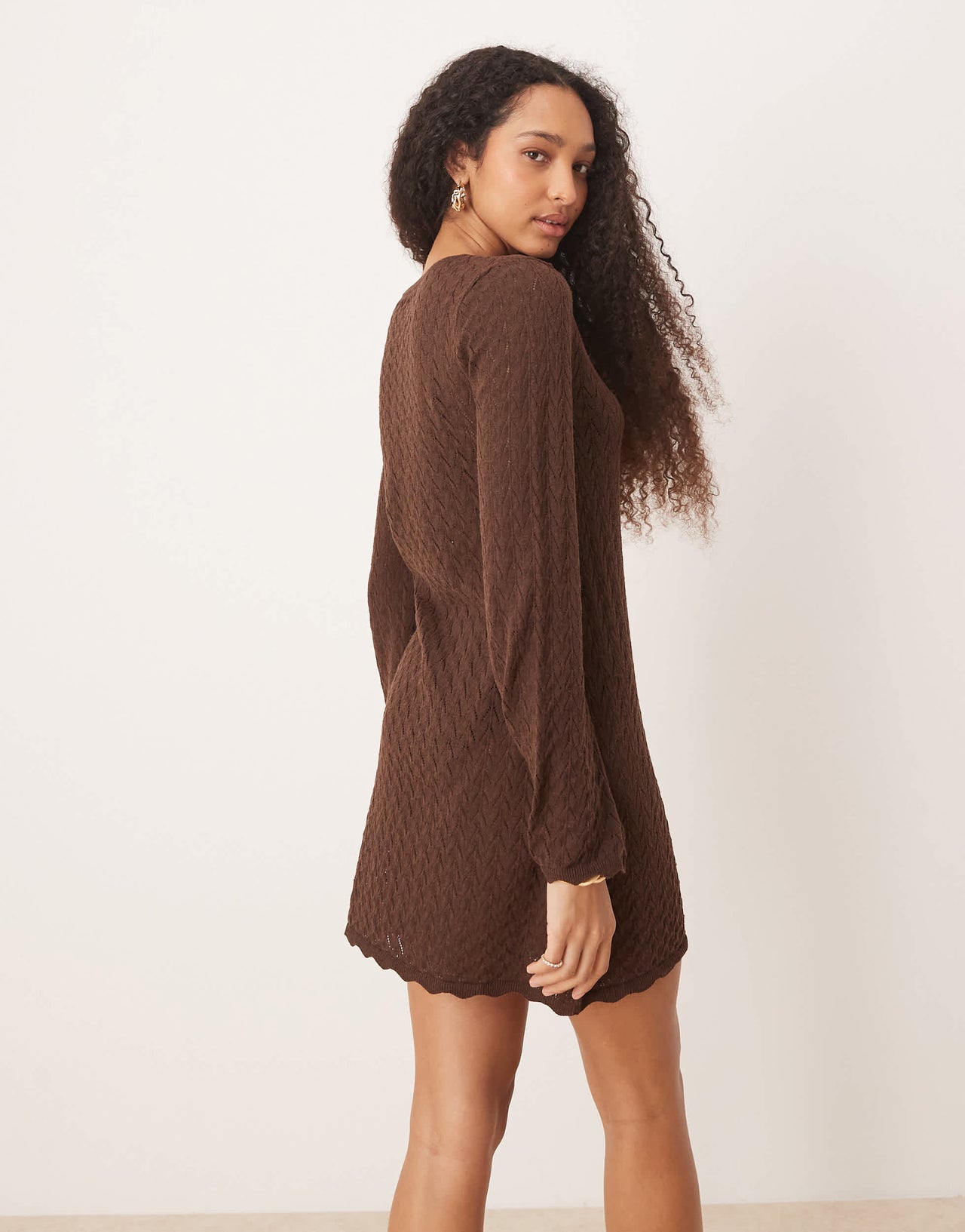 ASOS DESIGN knitted mini dress with flared sleeve in brown