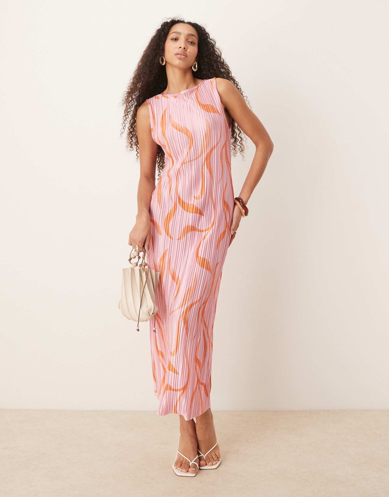 ASOS DESIGN plisse sleeveless midi dress in pink swirl print